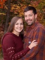 Dr. Spencer with wife smiling