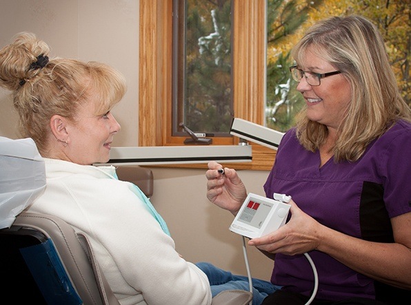 team member using cavity detection system